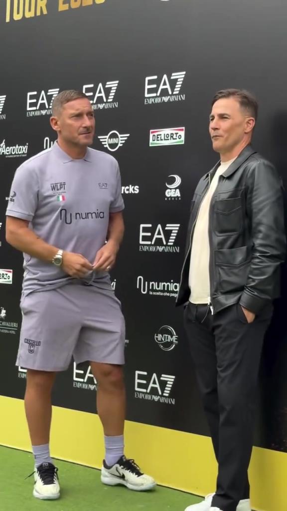 倆小老頭這么看卡納瓦羅也不矮啊,還是托蒂變矮了~